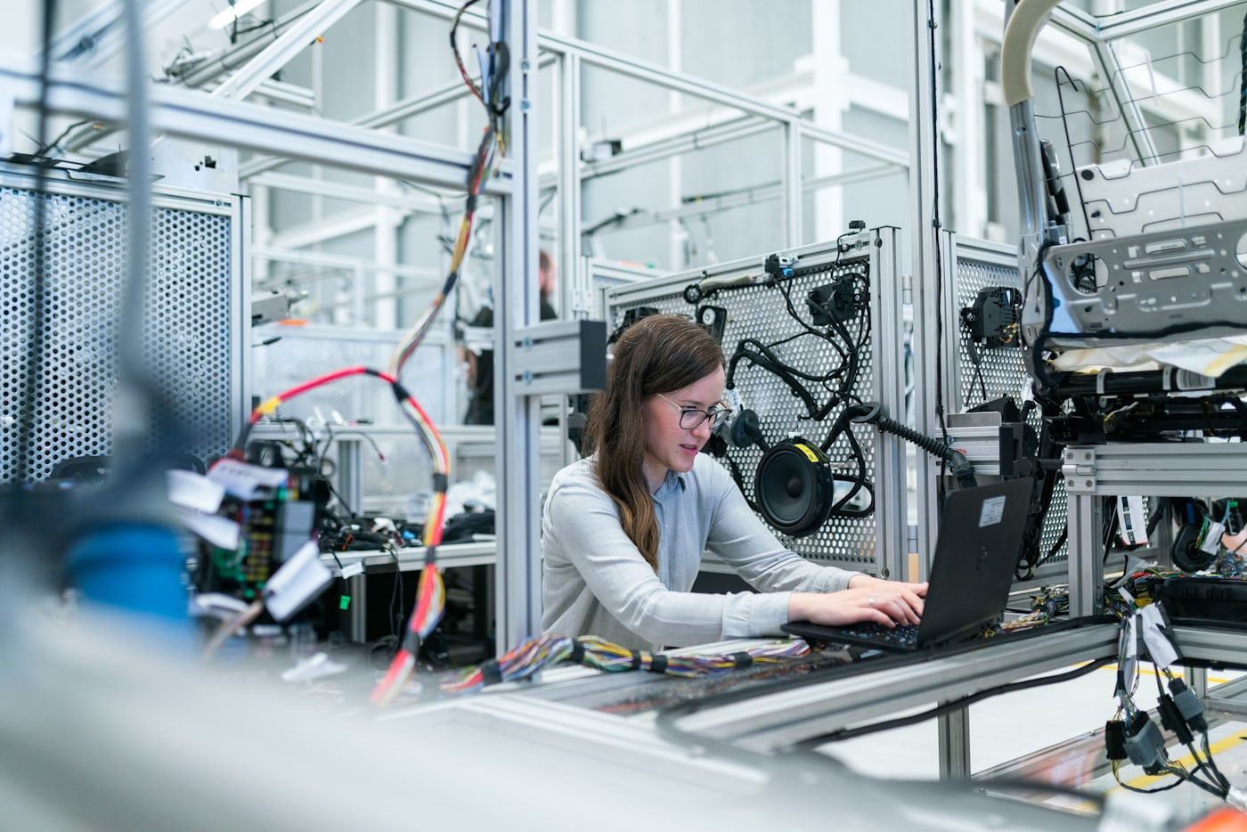 An engineer at work on a factory floor